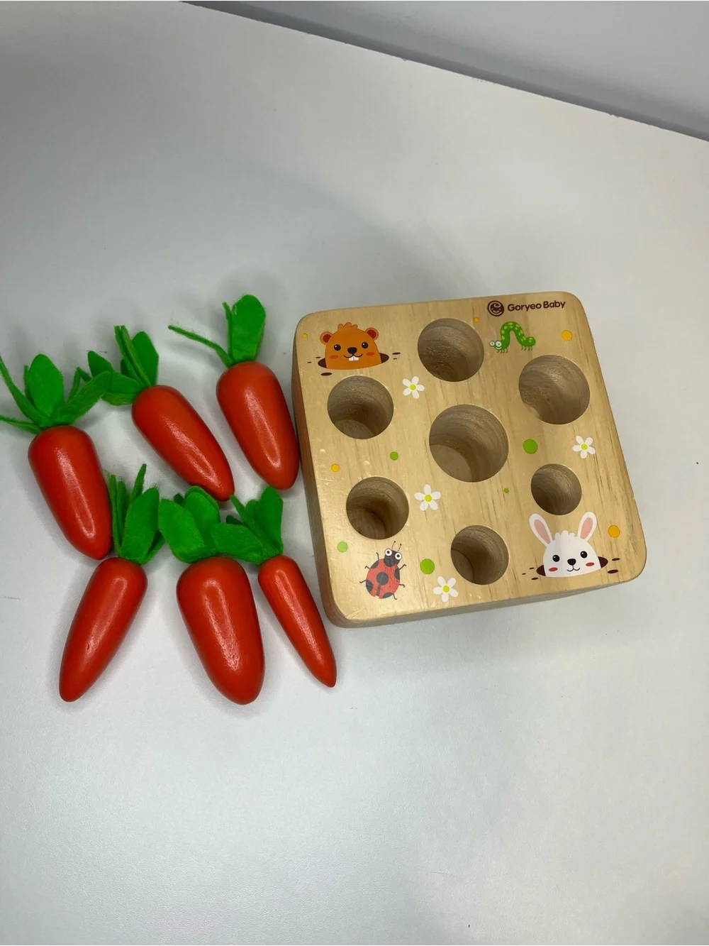 Wooden Pop-Up Garden Toy - Green & Orange Felt Leaves